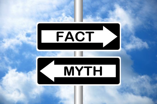 One way street signs that say fact and myth
